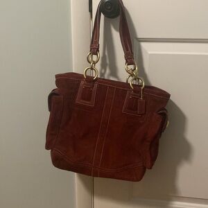 New dark red or bordeaux suede coach handbag